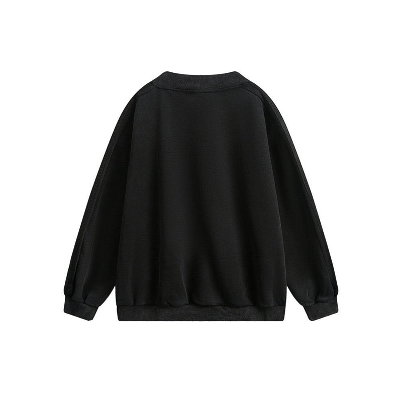 Back view of black pullover sweatshirt with ribbed collar, cuffs and hem