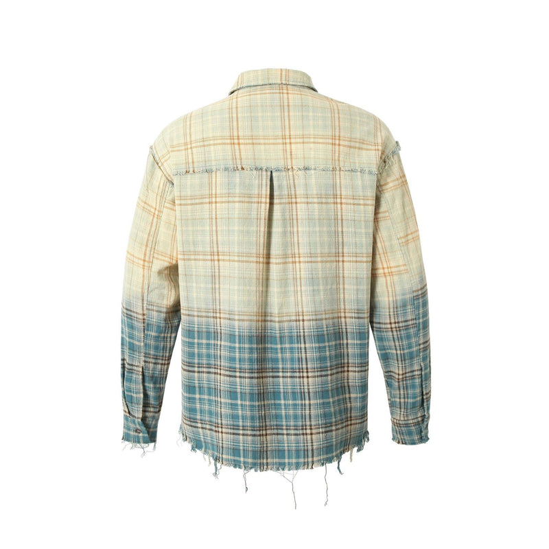 Back view of a blue and cream plaid flannel shirt with distressed raw hem