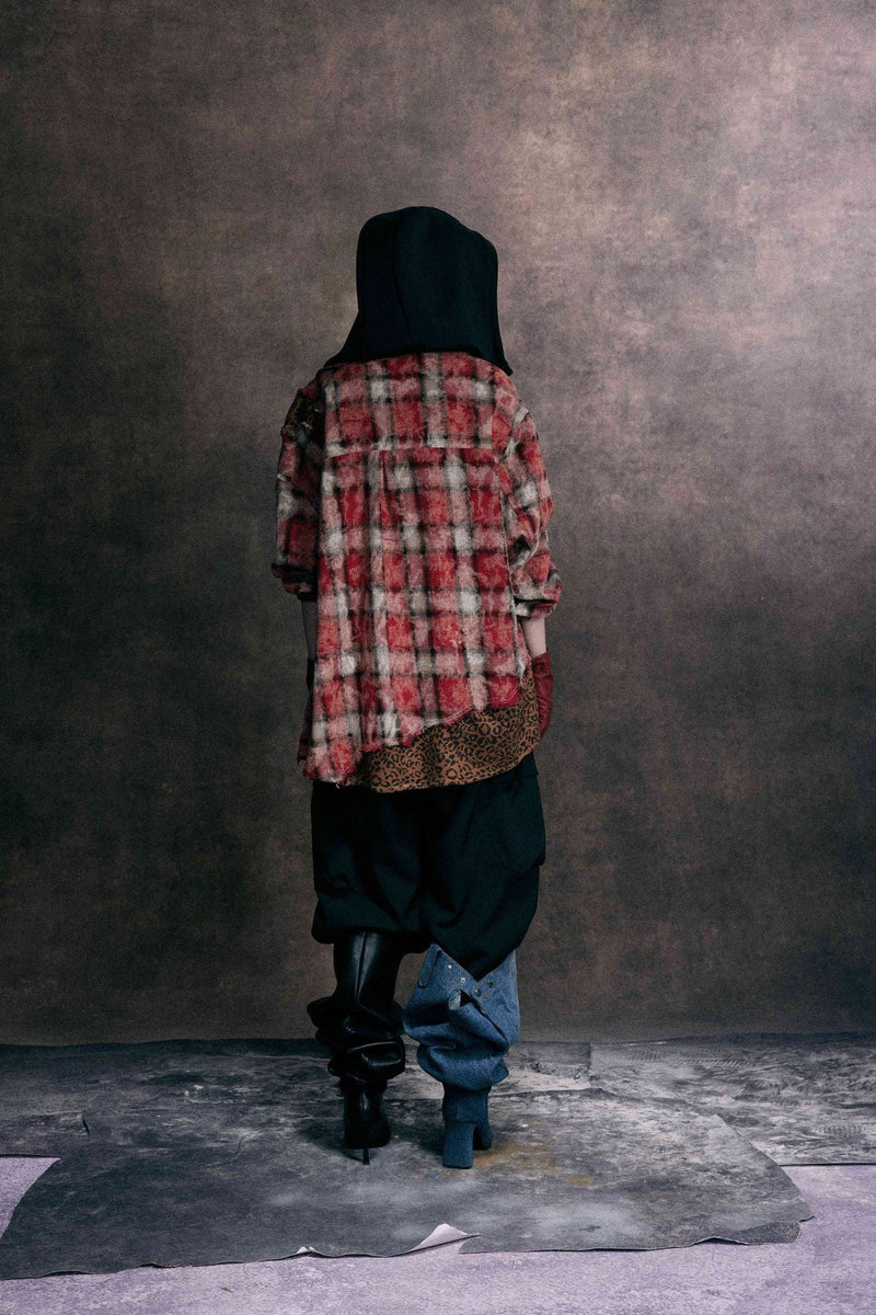 Back view of red plaid patchwork shirt with leopard print lower panel