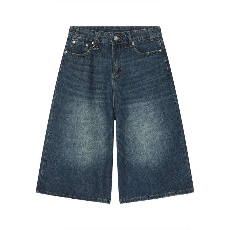 Dark blue wide-leg denim shorts with faded wash and front five-pocket design