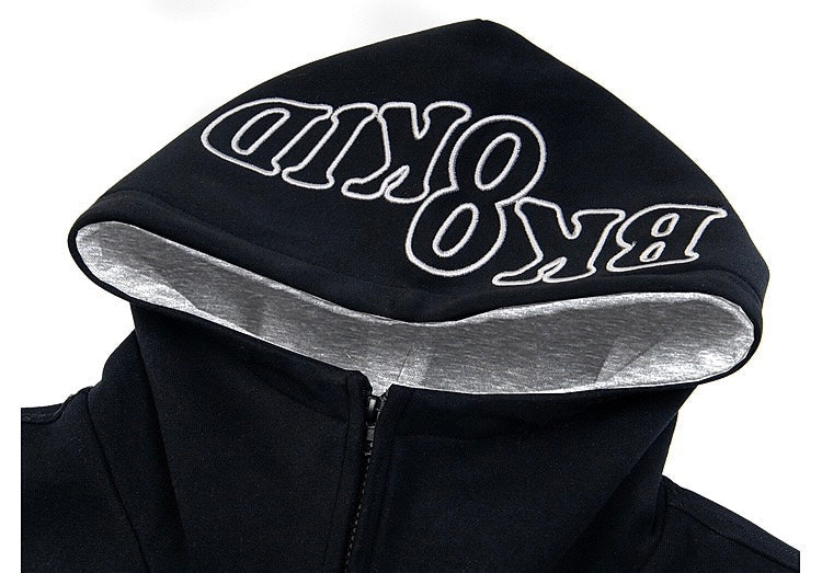 Close-up of hoodie hood with BKOKID print and gray lining