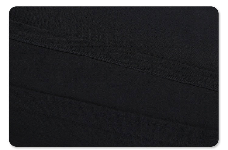 Black retro track polo tee with subtle contrast panel stitching and oversized athletic fit