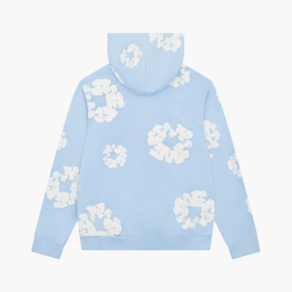 The Light Blue Denim Tears Hoodie – White Cotton features a hood and playful white cloud-like shapes on the back and sleeves, creating a simple yet eye-catching look inspired by classic Denim Tears style.