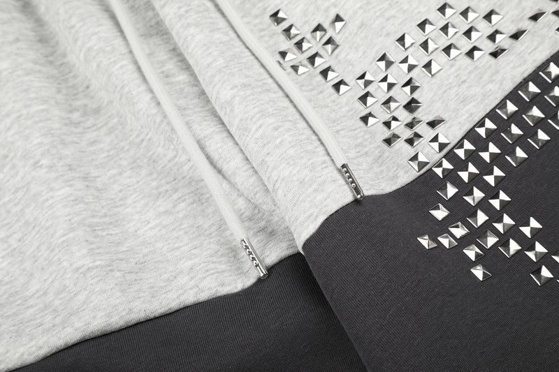 Gerade geschnittene Sweatpants – Colorblock-Baggy-Jogger mit Nieten-Grafik
