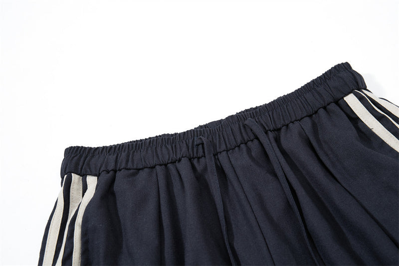 Pantalon de survêtement wide leg – Triple bande latérale, taille élastique à cordon