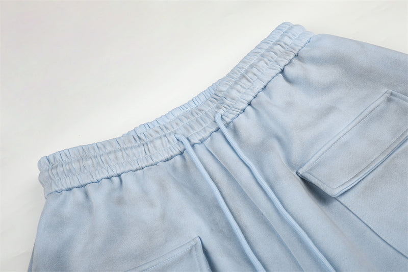 Pantalon de survêtement en velours côtelé à jambes larges avec imprimé script et poches cargo