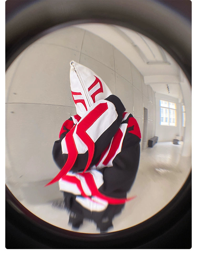 In a modern, minimalist room, a person wears a Seakoff Superhero-Inspired Hoodie—a 400GSM Oversized Black, Red, and White Zip-Up Streetwear Sweatshirt—concealing their face. The fisheye lens offers a circular view echoing comic book street fashion.