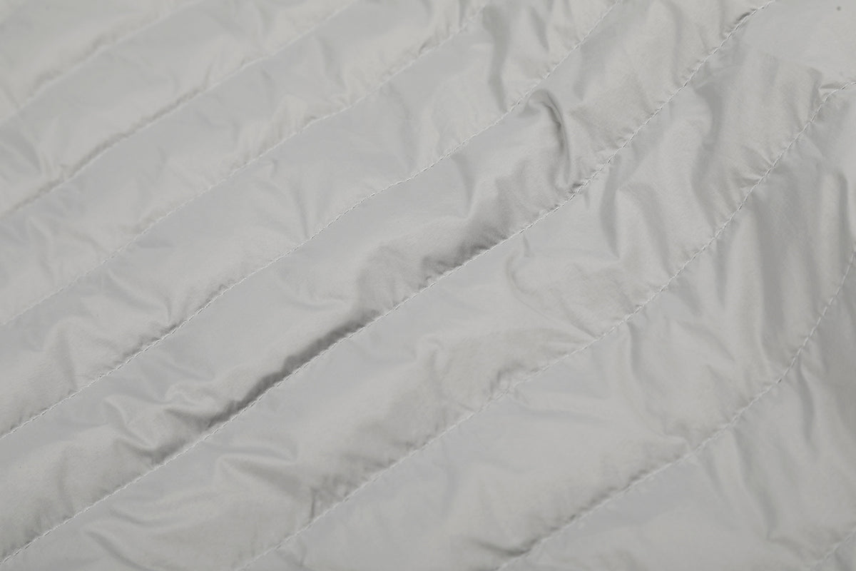 Gesteppte Puffer-Hybridjacke – Strickärmel und Stehkragen