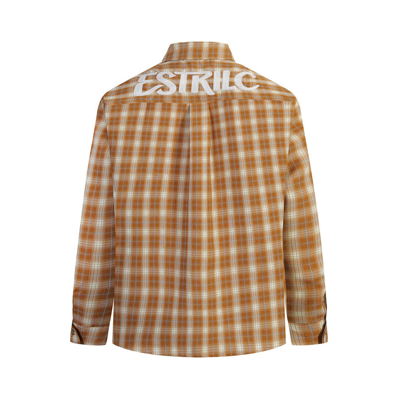 Tan plaid button-down shirt back view with large white embroidered logo across the shoulders
