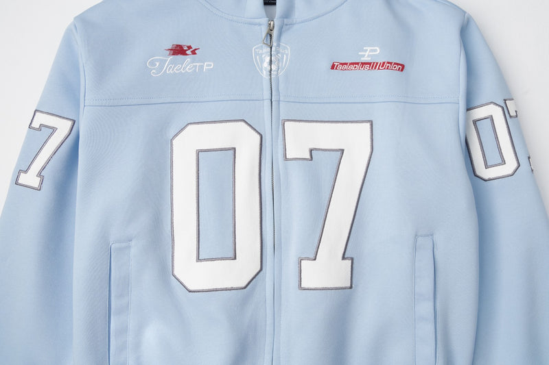 Sweat à capuche bleu zippé intégral avec patch brodé du numéro varsity 07
