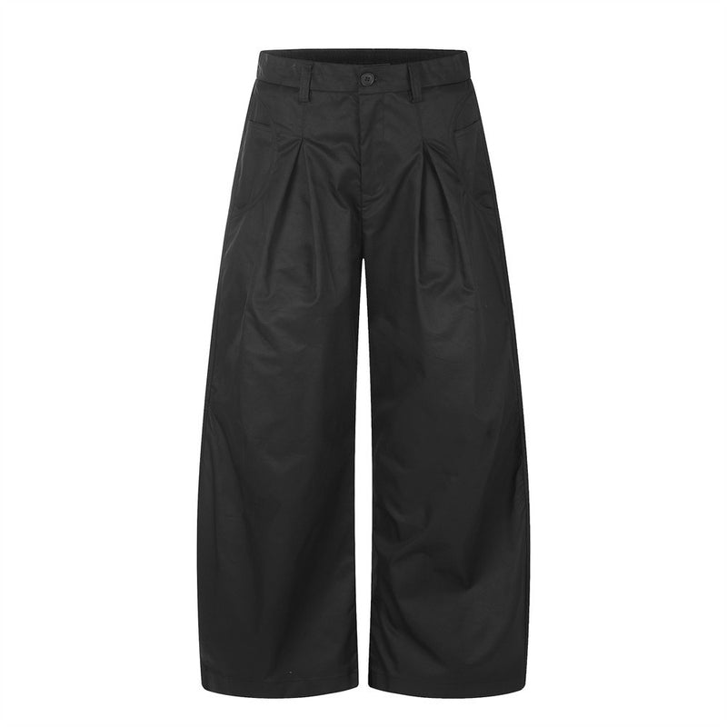 Wide-Leg Pleated Trousers – Oversized Silhouette with Curved Hem