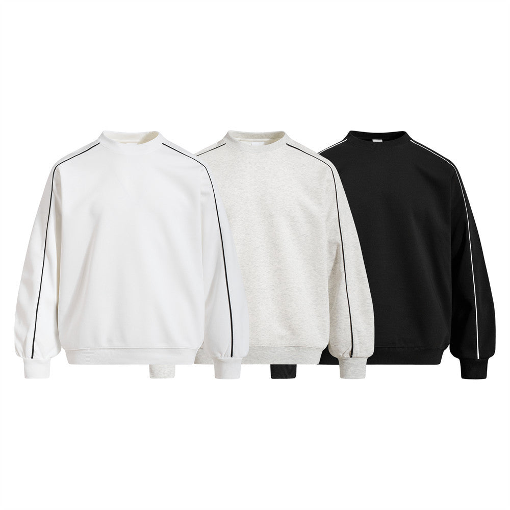 Oversized crew neck sweatshirt with contrast sleeve piping shown in Pearl White, Heather Gray, and Jet Black colorways