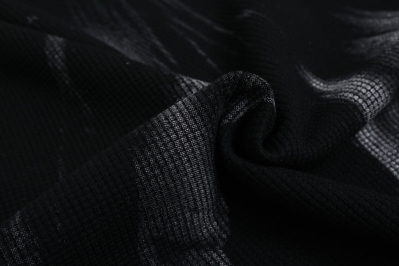 T-shirt graphique noir à manches longues avec détails cloutés et inscription
