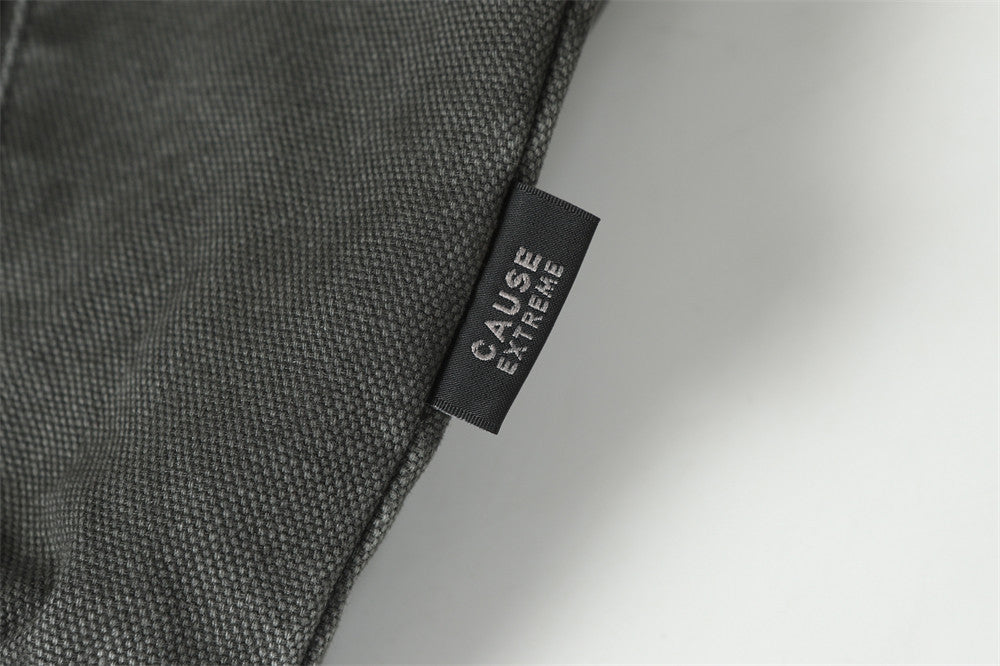 Blouson bomber déconstruit en toile à coutures effilochées et zip diagonal