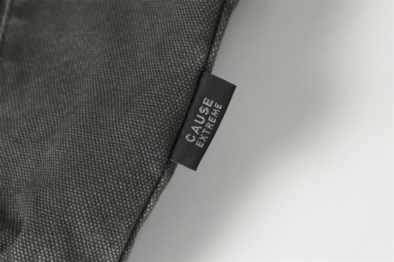 Blouson bomber déconstruit en toile à coutures effilochées et zip diagonal