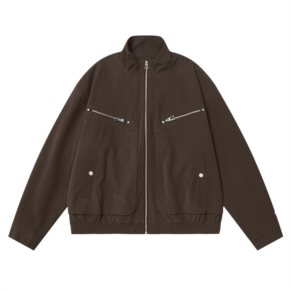 Men's oversized brown stand-collar full-zip jacket with chest zip pockets and lower cargo patch pockets, front and back view