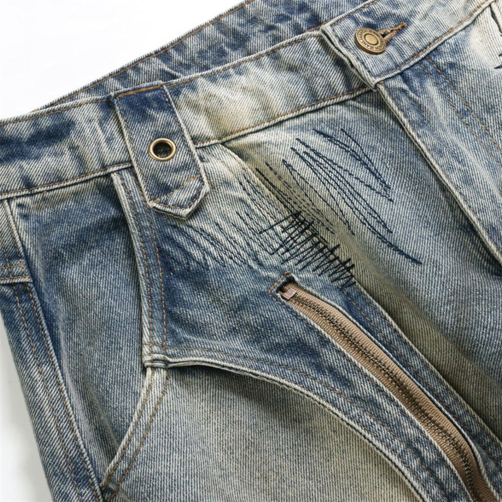 Baggy Wide-Leg Jeans – Chaotic Embroidery, Distressed Denim & Arc-Hem Design