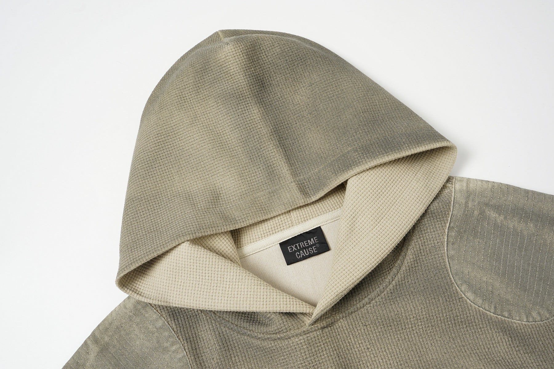 Oversized-Waffelstrick-Hoodie mit dekonstruierter Utility-Reißverschlusstaschen-Optik & Veloursleder