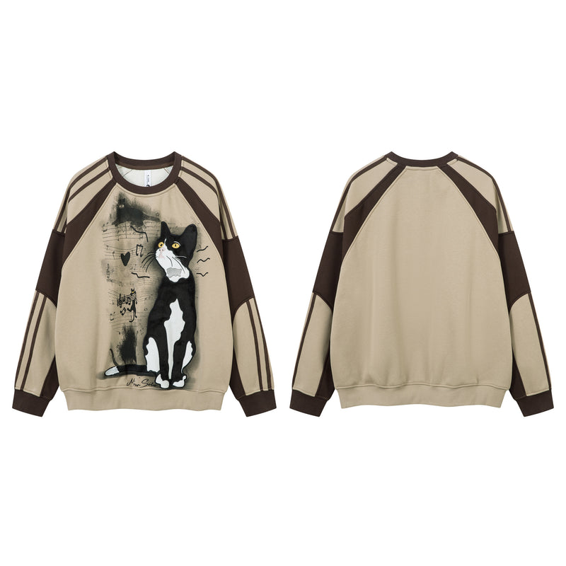 Sweat-shirt motif chat en smoking avec imprimé note de musique et manches raglan color block