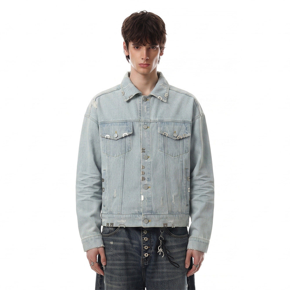 Model wearing a light wash distressed denim jacket with dual chest pockets and silver-tone hardware