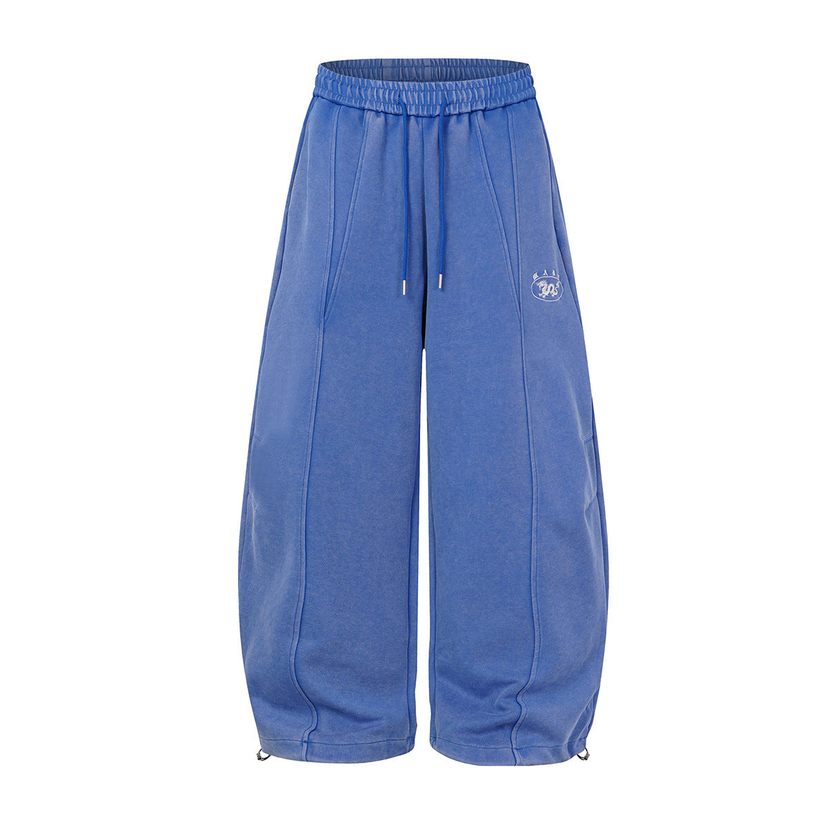 Oversized wide-leg acid wash sweatpants in blue with balloon silhouette, front seam detail, and drawstring hem