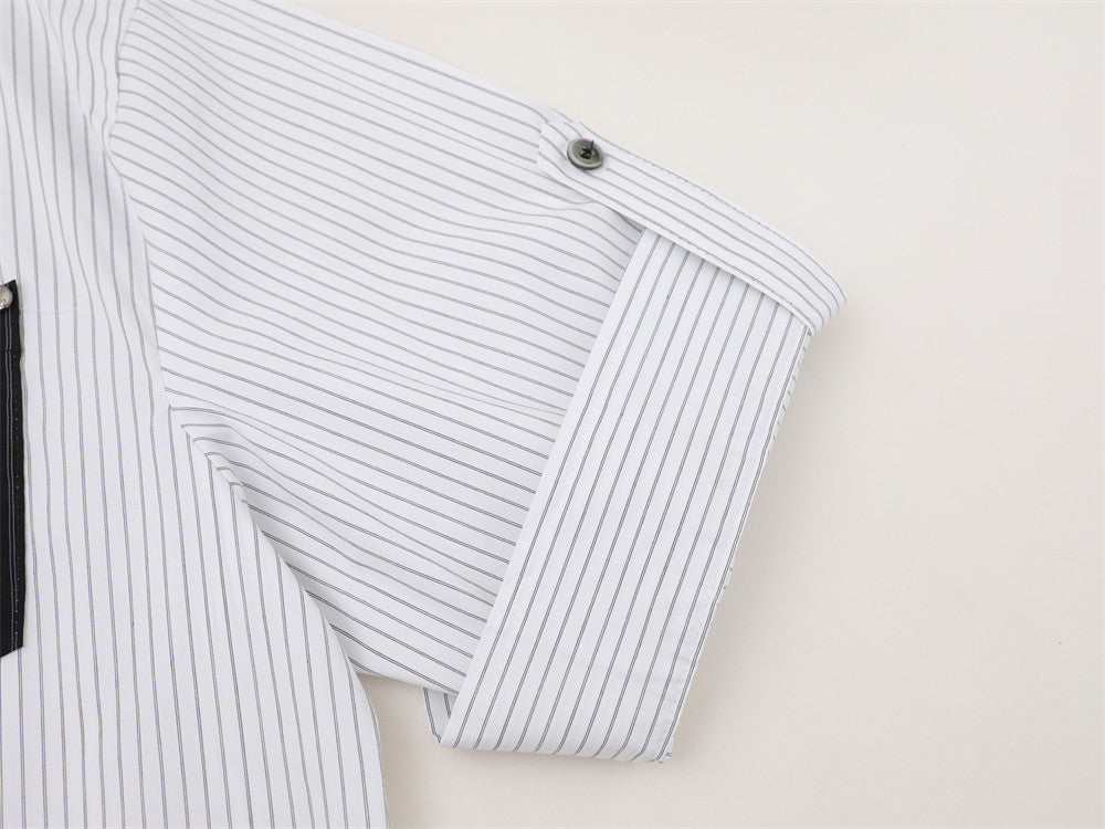 White striped rolled short sleeve with button tab detail close-up