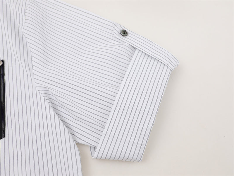 White striped rolled short sleeve with button tab detail close-up