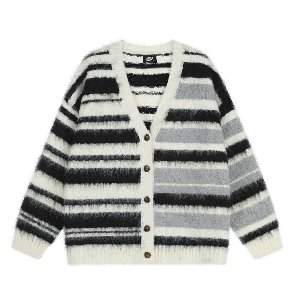 Oversized striped V-neck cardigan sweater in cream with black and grey horizontal stripes, button-front fuzzy knit