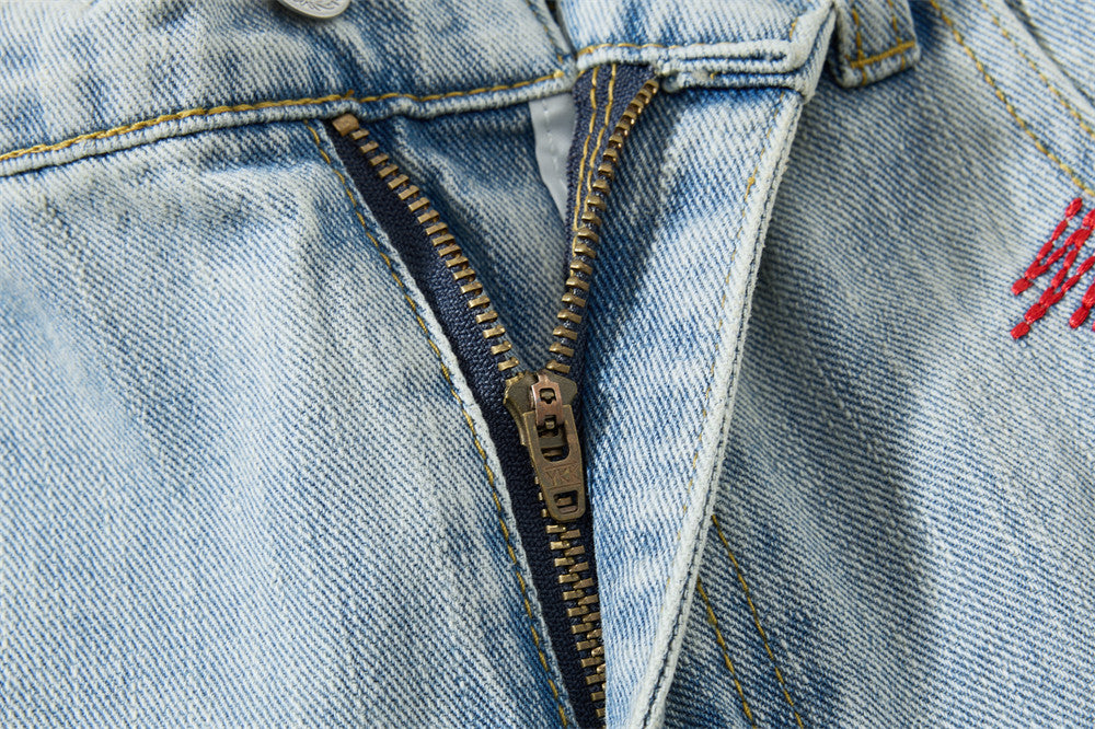 Wide-Leg Washed Denim Jeans with Cross Star Embroidery & Rhinestone Pocket