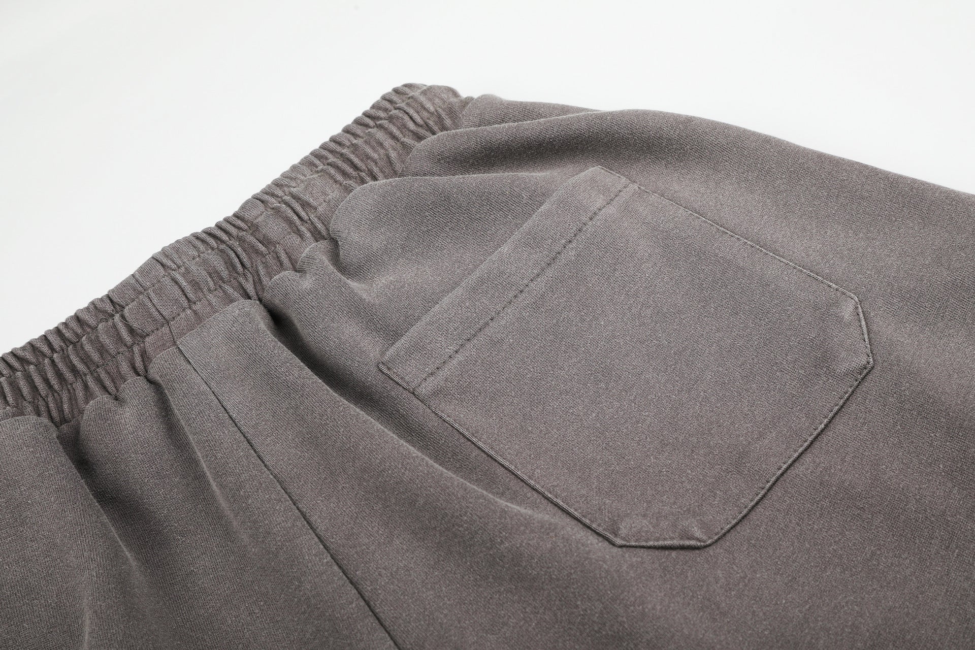 Pantalones de chándal de pierna ancha con cruz estampada y acabado lavado ácido