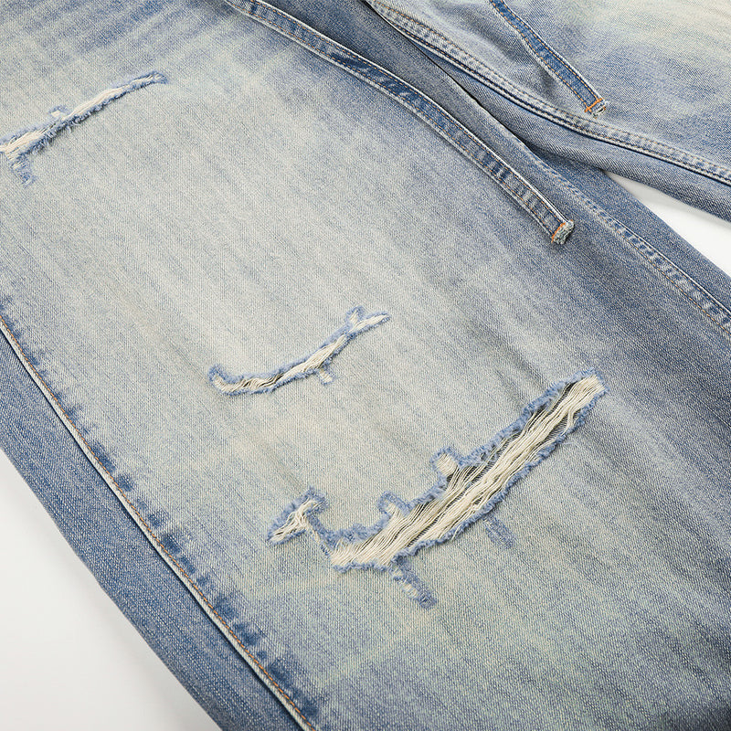 Wide-Leg Distressed Jeans – Gradient Washed Denim with Ripped Details