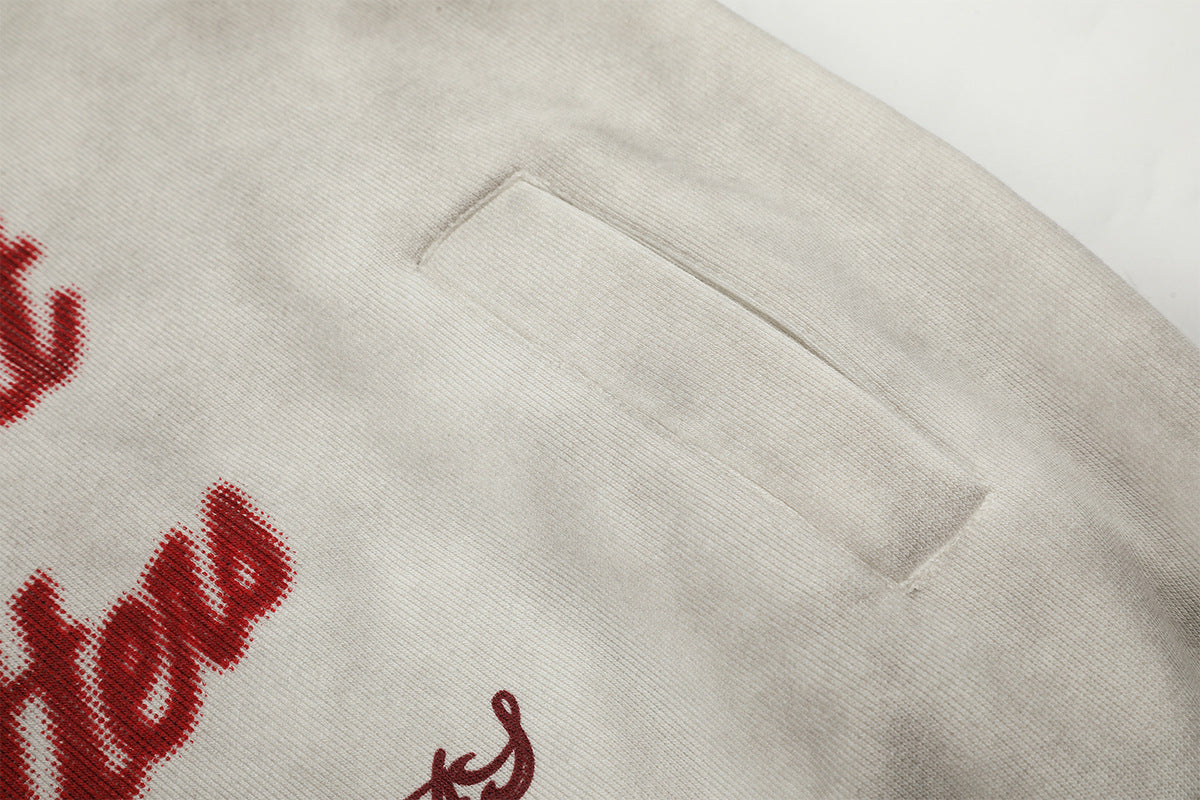 Sudadera desgastada con cremallera, gráfico de cruz y estampado de letras