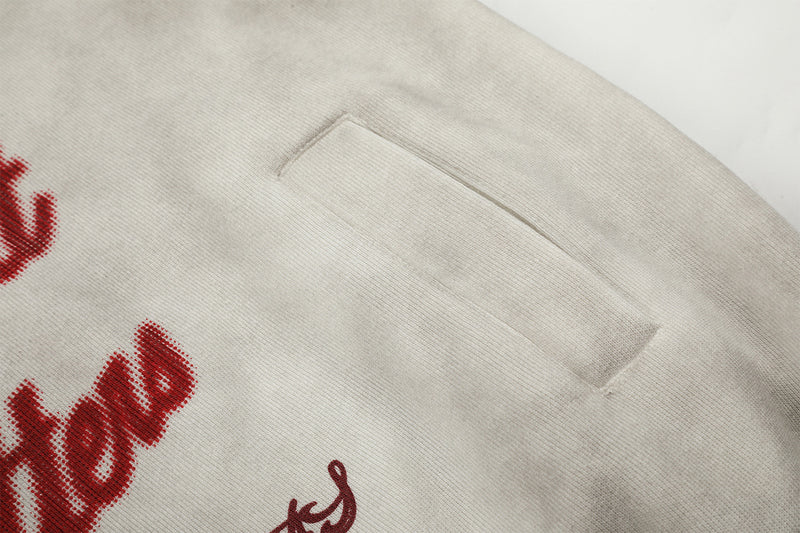 Sudadera desgastada con cremallera, gráfico de cruz y estampado de letras