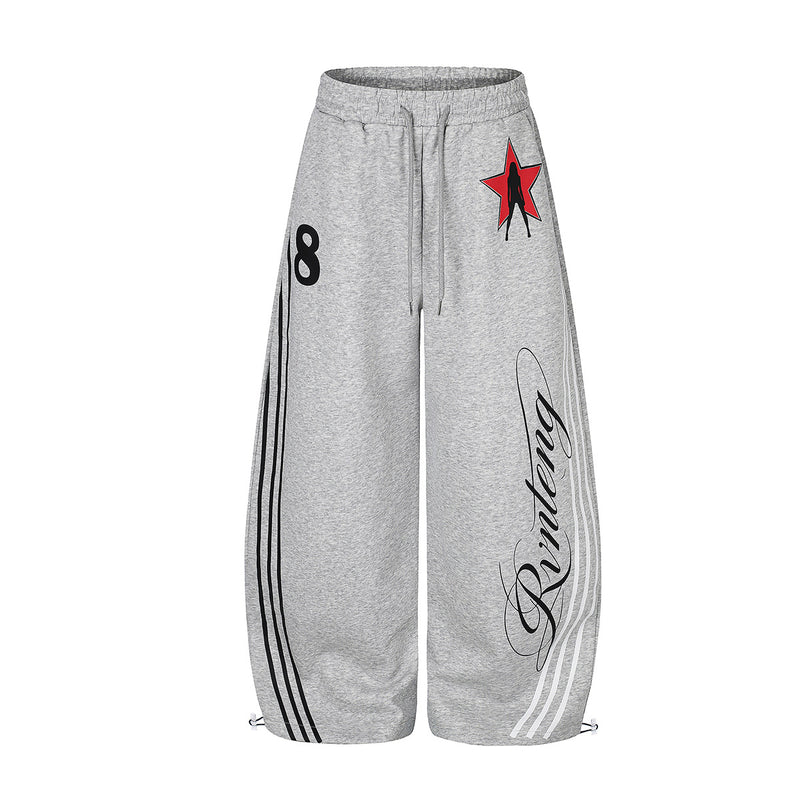 Pantalon de jogging à jambes larges gris chiné, rayures latérales rétro, imprimé graphique cursif et écusson étoile rouge sur la hanche