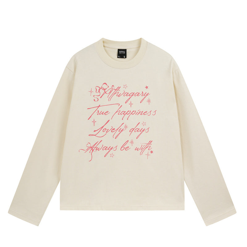 Oversized long-sleeve crewneck tee with hand-drawn cursive script graphic print in black and apricot colorways