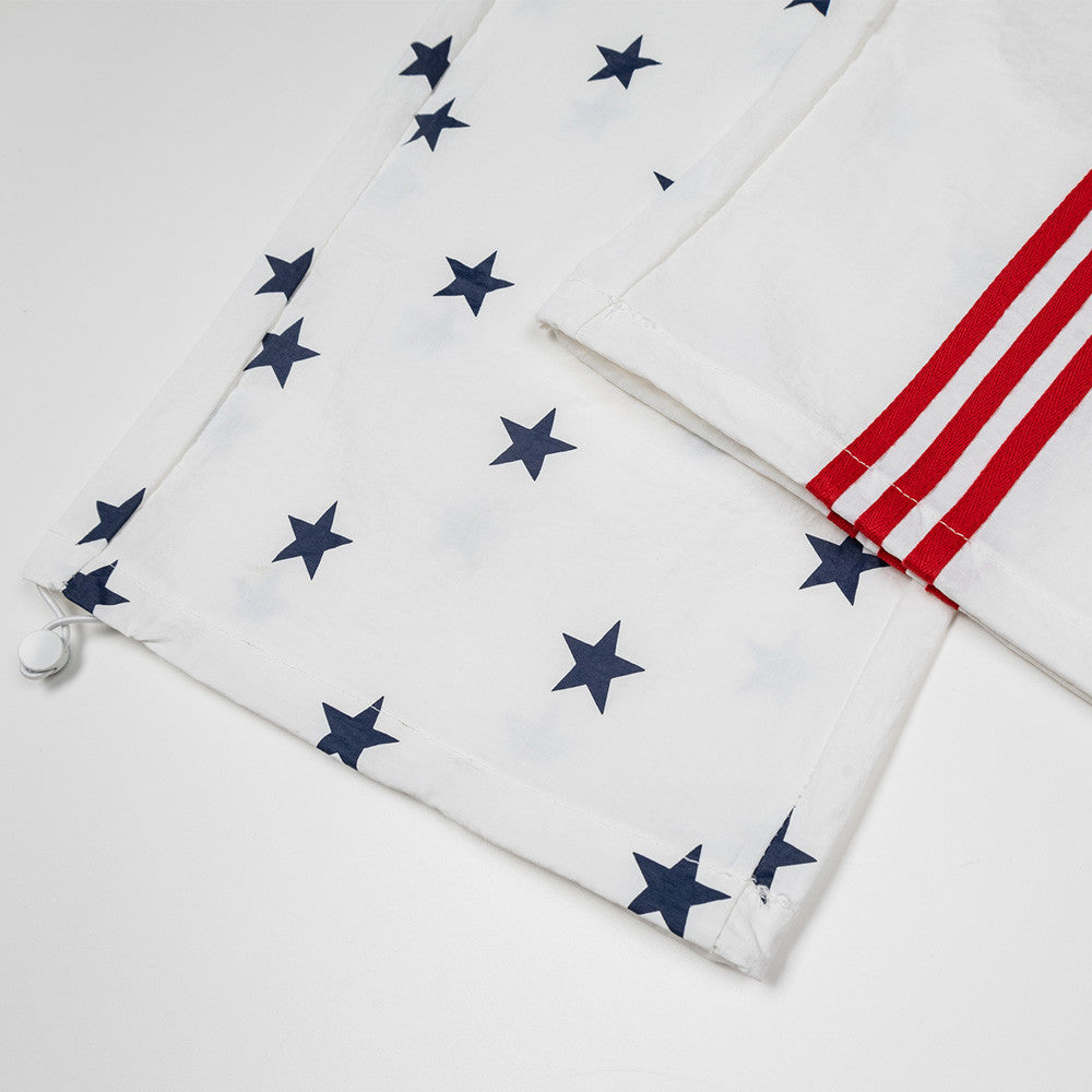 Wide-Leg Track Pants with Star Print and Triple Side Stripe