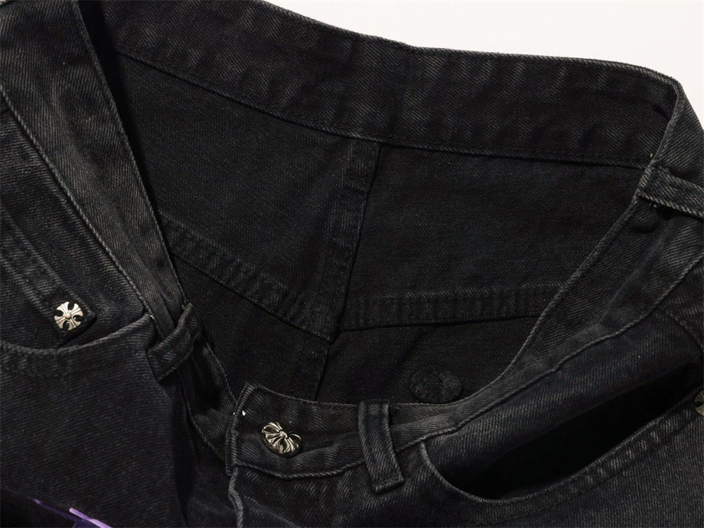 Close-up of black jeans waistband and inner front pocket area