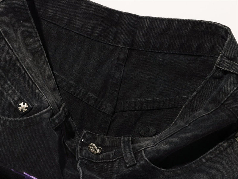 Close-up of black jeans waistband and inner front pocket area