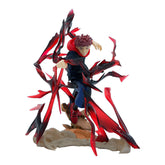 The Jujutsu Kaisen Yuji Itadori PVC Figure is an 18 cm collectible statue featuring the anime character in an action pose with jagged red extensions, spiky brown hair, and red-dark attire, standing confidently on a rock-like base while channeling cursed energy effects.