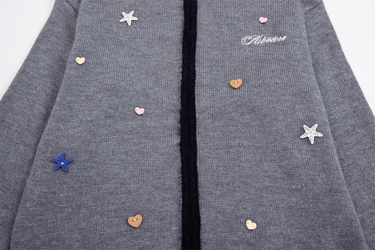 Gilet en maille zippé avec ornements cœur et étoile