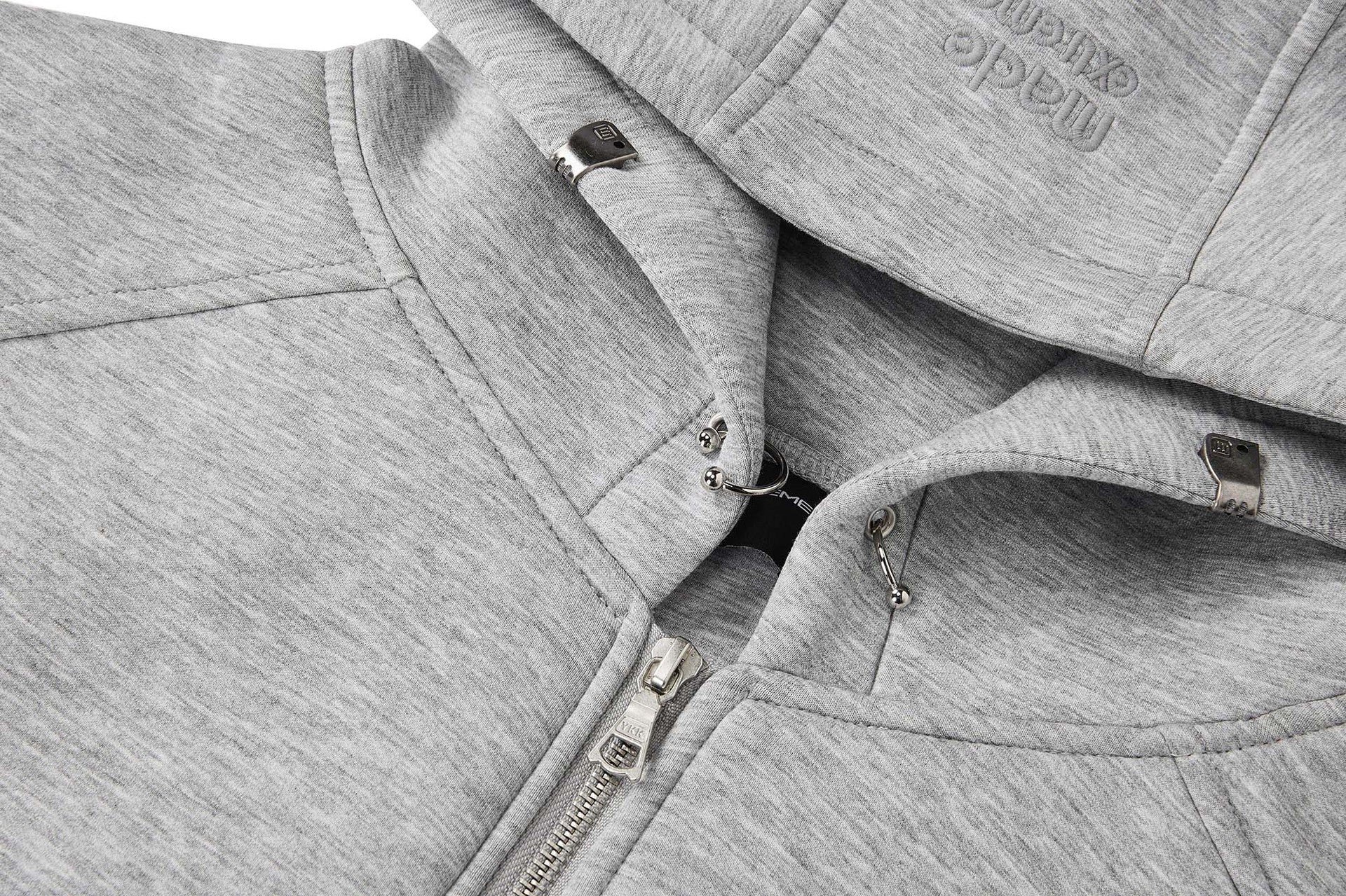 Gilet sweat à capuche sans manches zippé avec détails rivetés