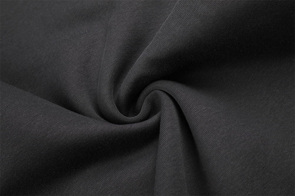Pantalones de Chándal de Pierna Ancha con Bloques de Color y Detalles Gráficos de Tachuelas Plateadas