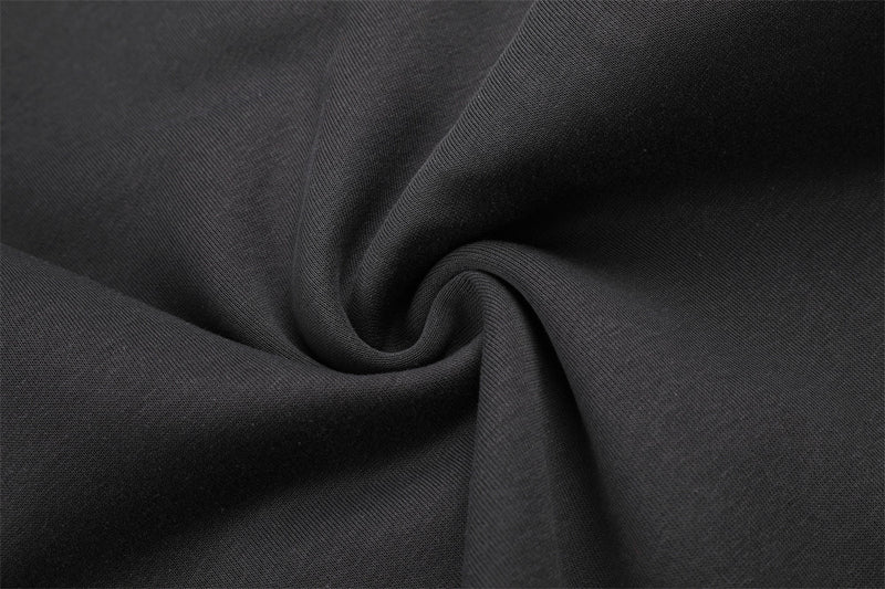Pantalones de Chándal de Pierna Ancha con Bloques de Color y Detalles Gráficos de Tachuelas Plateadas