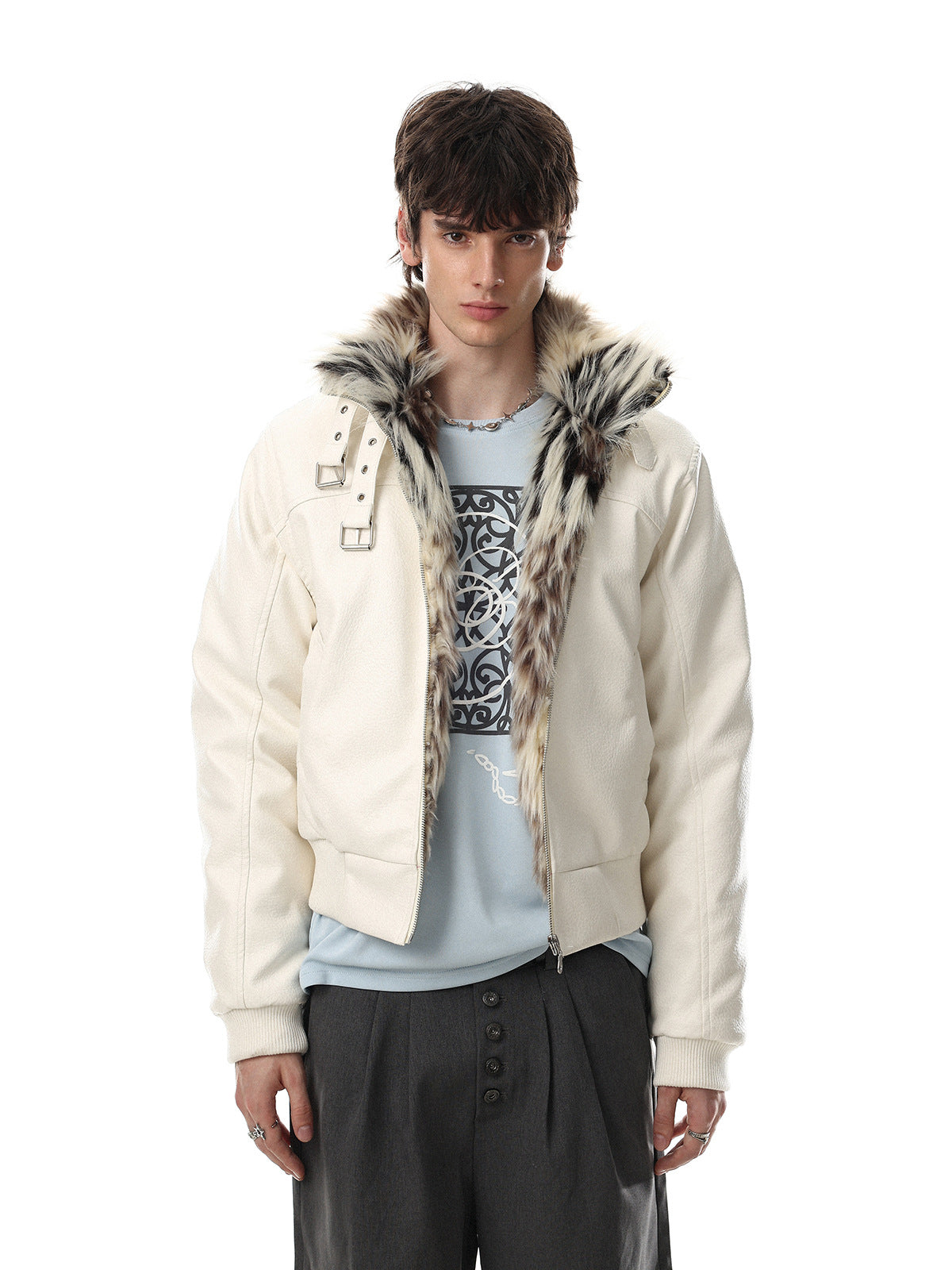 Oversized faux leather bomber jacket with faux fur buckle collar in off-white, worn open over a graphic tee and wide-leg trou