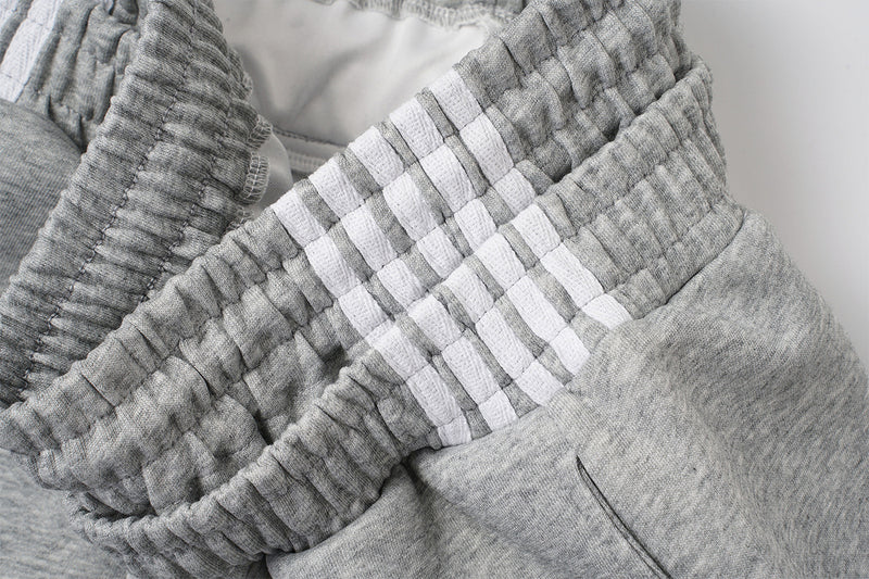 Ensemble veste de survêtement rétro à trois bandes et pantalon large avec écusson brodé