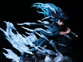 The Muichiro Tokito Demon Slayer Figure - 18cm Mist Hashira by Demon Slayer features the character with long hair and a sword, crouching amidst dynamic mist effects. Poised for action, this premium PVC collectible captures his Mist Breathing techniques against a dark background.