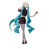 The Hatsune Miku Black Chocolate Pastry Chef 21cm PVC figure features the iconic character with long teal hair, wearing a white beret and a black outfit with white stripes, posed elegantly holding a small brown accessory in her right hand while facing away.