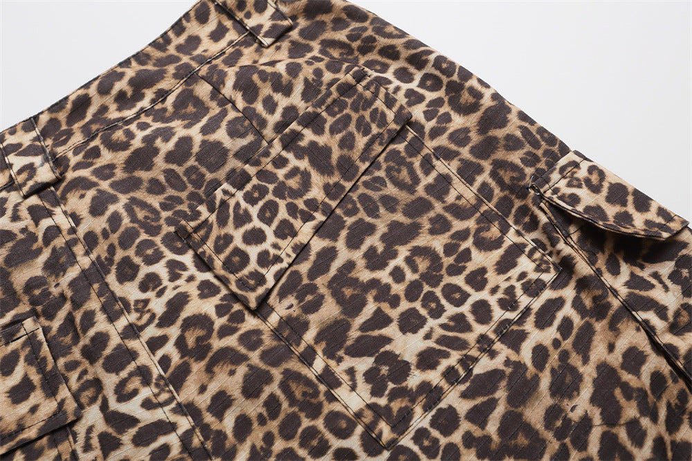 Close-up of leopard print shorts back pocket flap and waistband with side cargo pocket