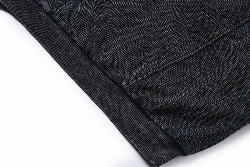Blouson bomber en maille gaufrée délavée à l’acide avec rivets métalliques