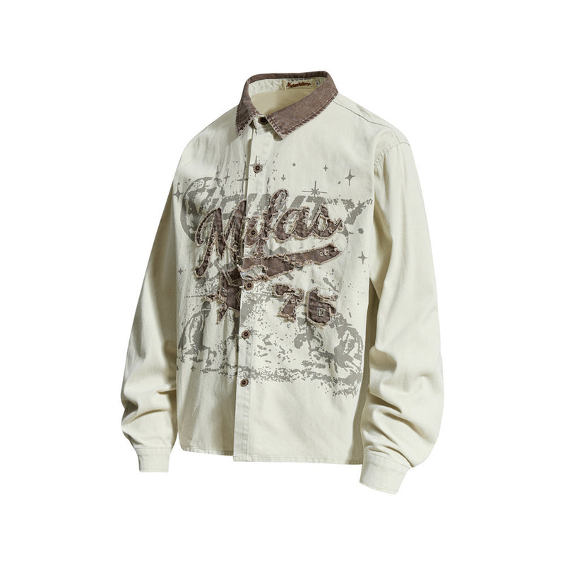 Cream long sleeve button-up shirt with distressed vintage graphic, angled front view